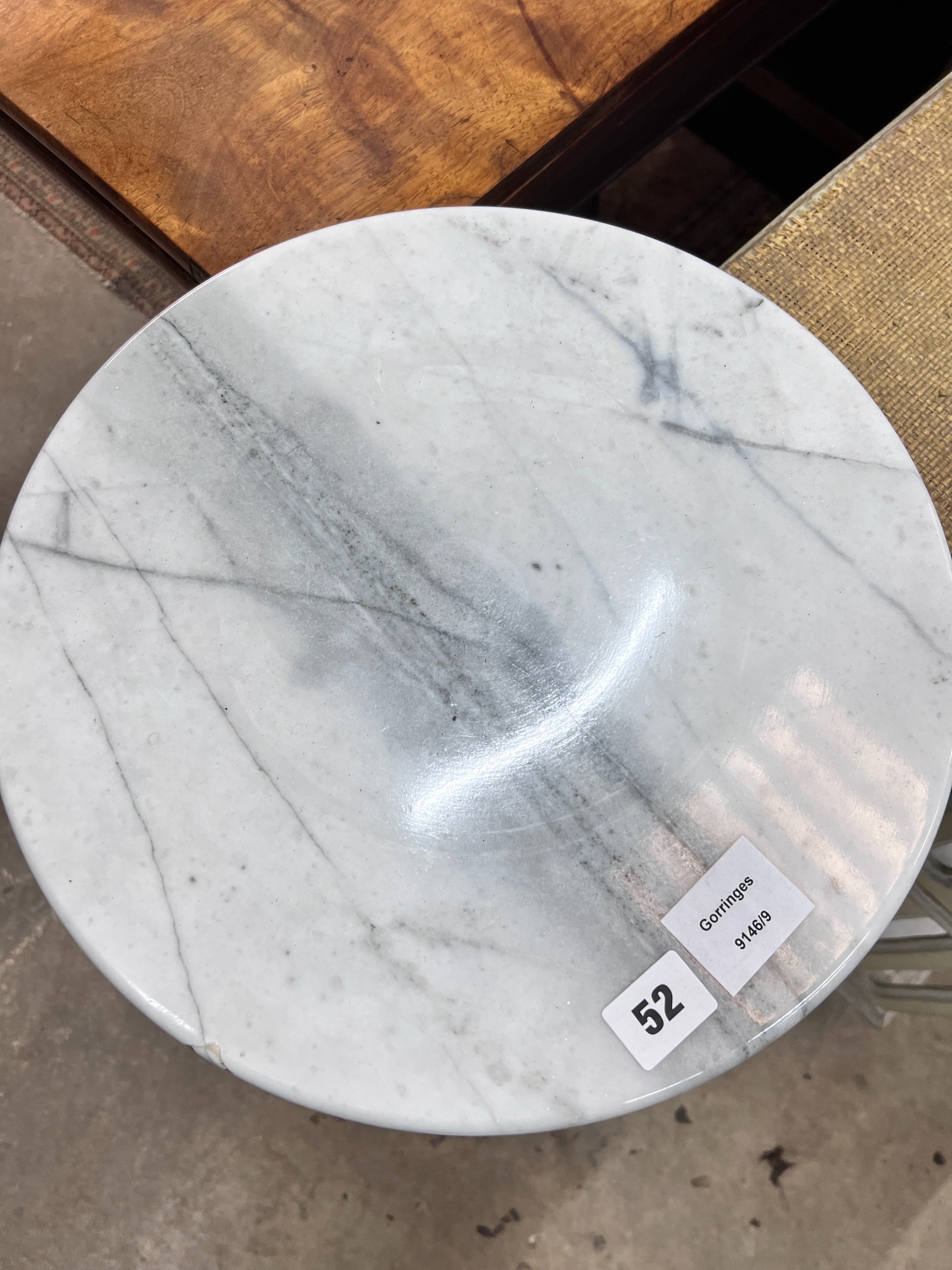 A circular marble pedestal, diameter 35cm, height 80cm *Please note the sale commences at 9am.